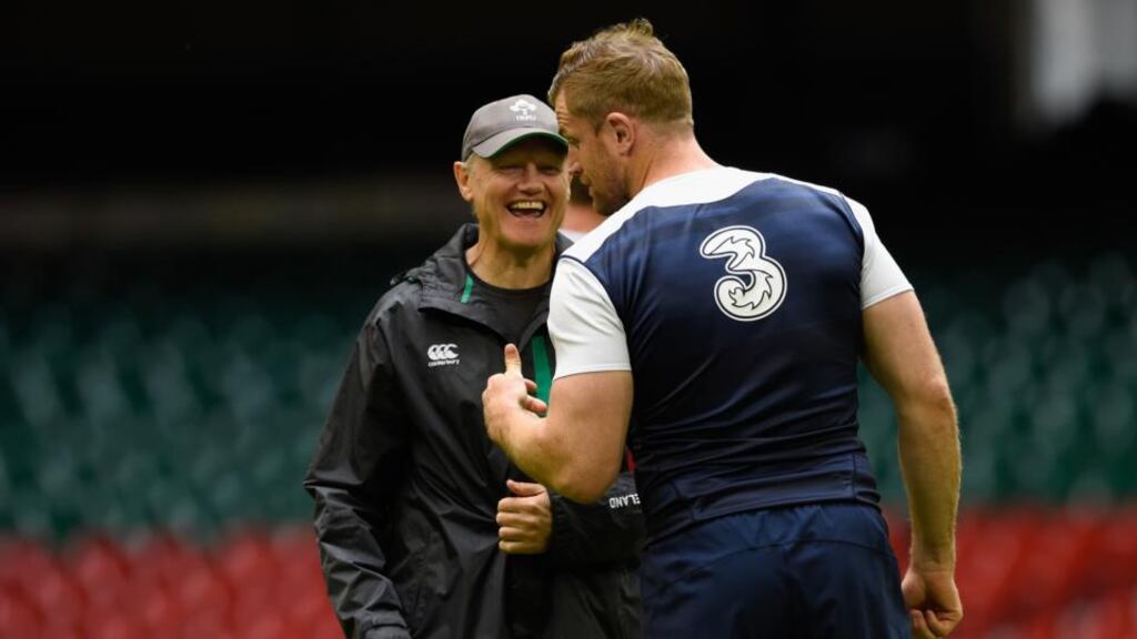 Ireland captain Jamie Heaslip in relaxed mood with head coach Joe Schmidt during the captain’s run at the Millennium Stadium. Photograph: Stu Forster/Getty Images