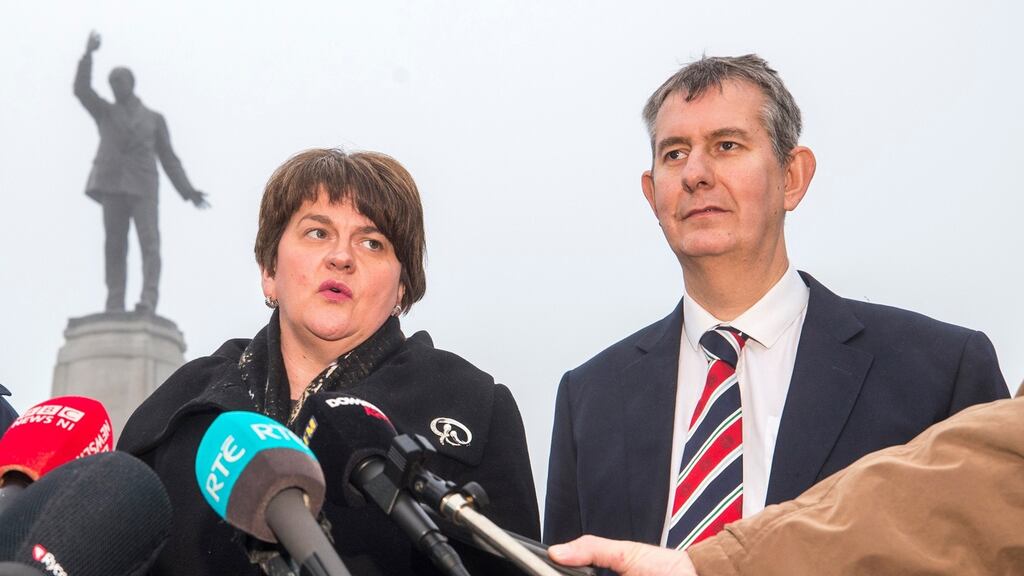 The DUP’s Edwin Poots alongside party leader Arlene Foster as she speaks to media at Carson Statue. File Photograph: Liam McBurney/PA