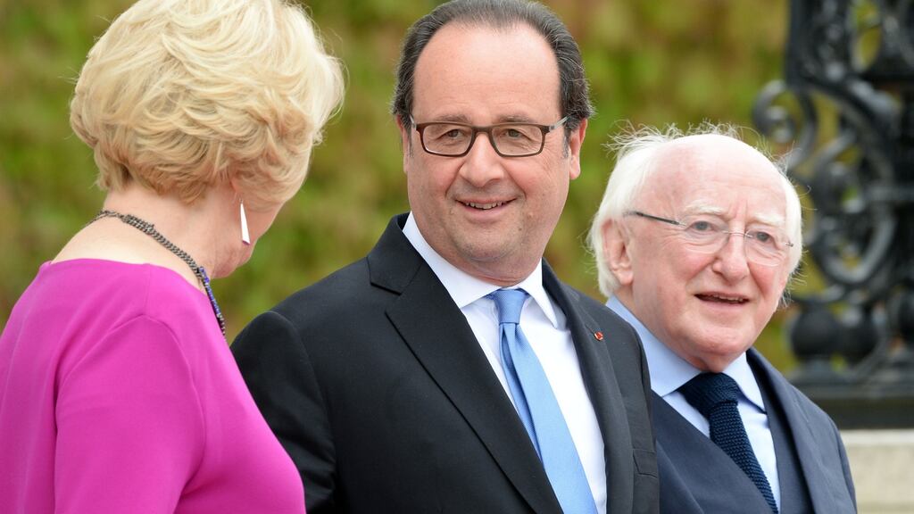 President Francois Hollande with President Michael D Higgins and his wife, Sabina Higgins, at Áras an Uachtaráin yesterday. Photograph: Eric Luke