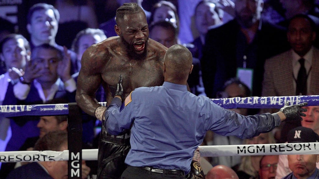 Deontay Wilder reacts after losing to Tyson Fury in their WBC World Heavyweight Title fight in Las Vegas. Photo: John Gurzinski/AFP via Getty Images