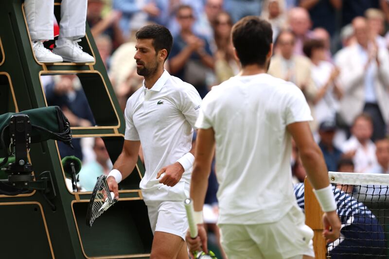 Novak Djokovic smashes his racket during the men's final at Wimbledon. Photograph: Clive Brunskill/Getty Images