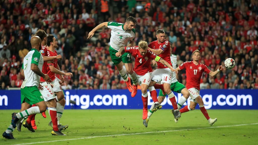 Shane Duffy heads home Ireland’s equaliser during the Euro 2020 qualifier against Denmark at the Parken Stadium in Copenhagen. Photograph: Bradley Collyer/PA Wire