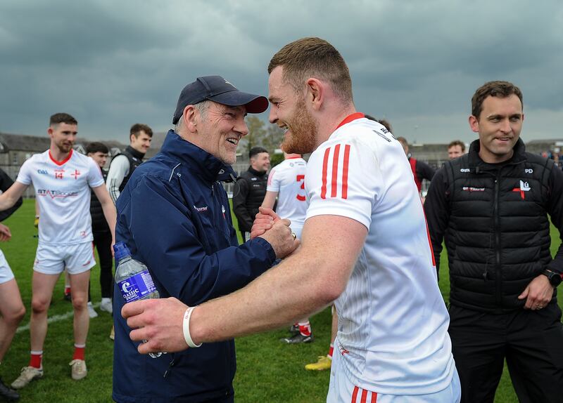Louth manager Mickey Harte celebrates with Niall Sharkey after the victory over Westmeath at Páirc Tailteann, Navan. Photograph: Tommy Grealy/Inpho