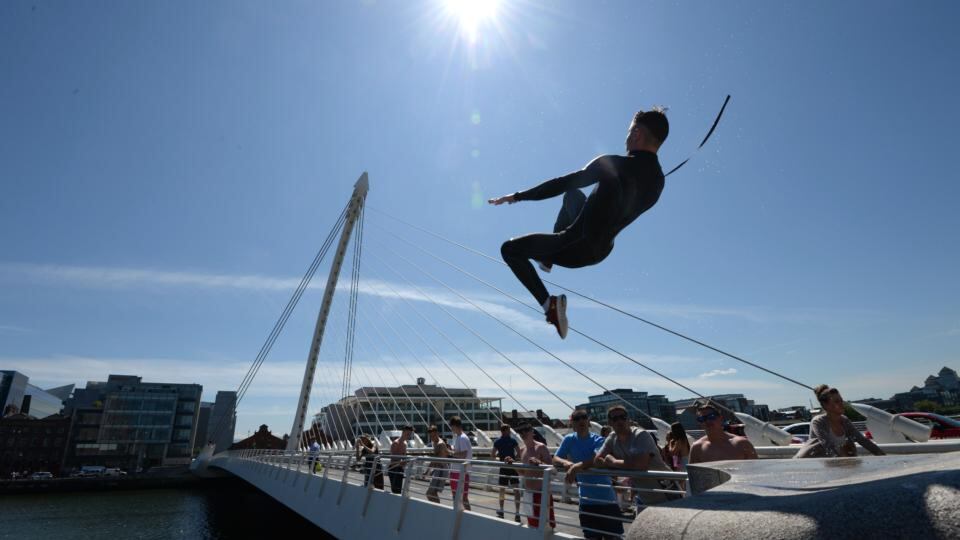 Jumping from Samuel Beckett bridge in Dublin’s Docklands. Photograph; Dara Mac Dónaill/The Irish Times.