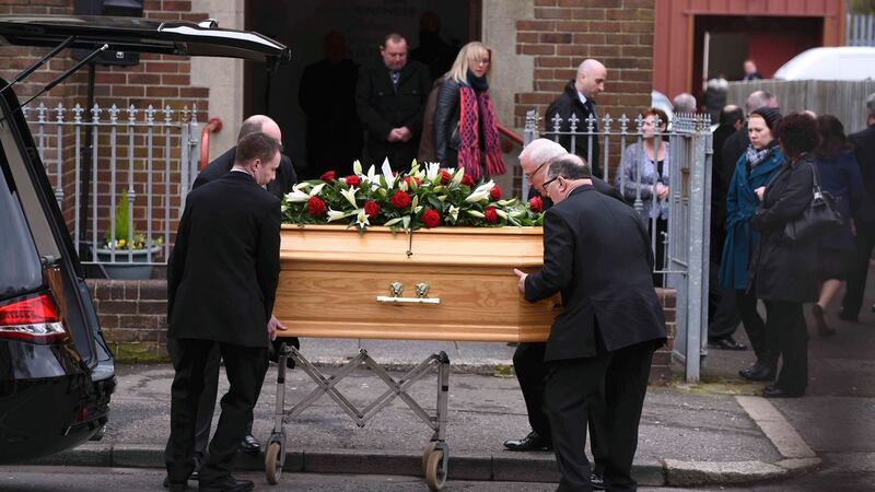 The coffin of prison officer Adrian Ismay is carried into Woodvale Methodist Church for his funeral service in Belfast. Photograph: Clodagh Kilcoyne/Reuters