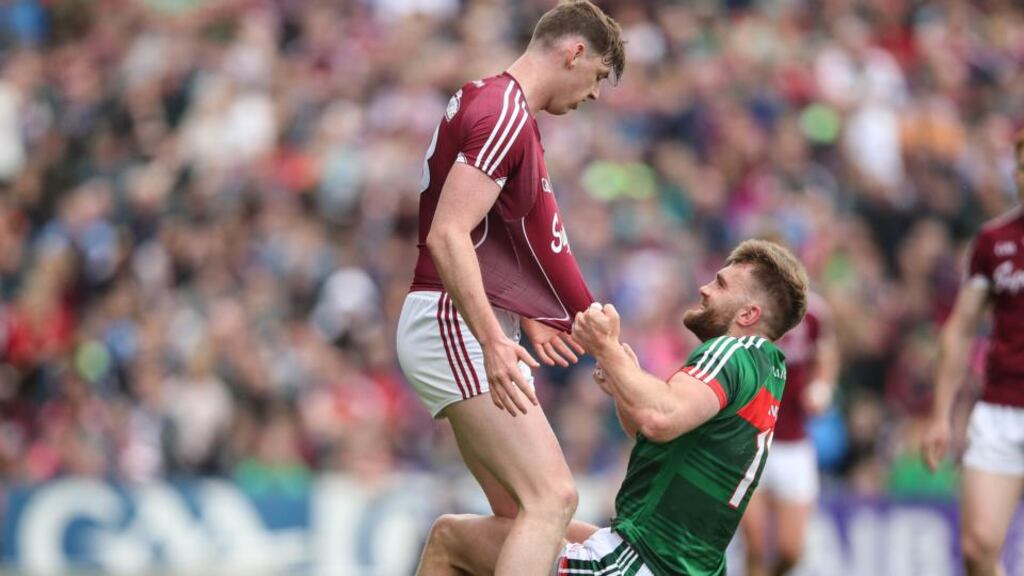 Tom Flynn of Galway and Mayo’s Aidan O’Shea during Sunday’s Connacht Football Championship quarter-final in MacHale Park, Castlebar. Photograph: Cathal Noonan/Inpho