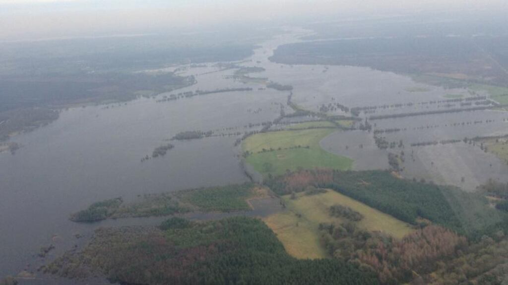 Western and southern counties have experienced serious flooding in recent weeks. This undated handout photo issued by Defence Forces Ireland of flooding along the river Shannon near Ballinalose. File photorgaph: Defence Forces Ireland/PA Wire