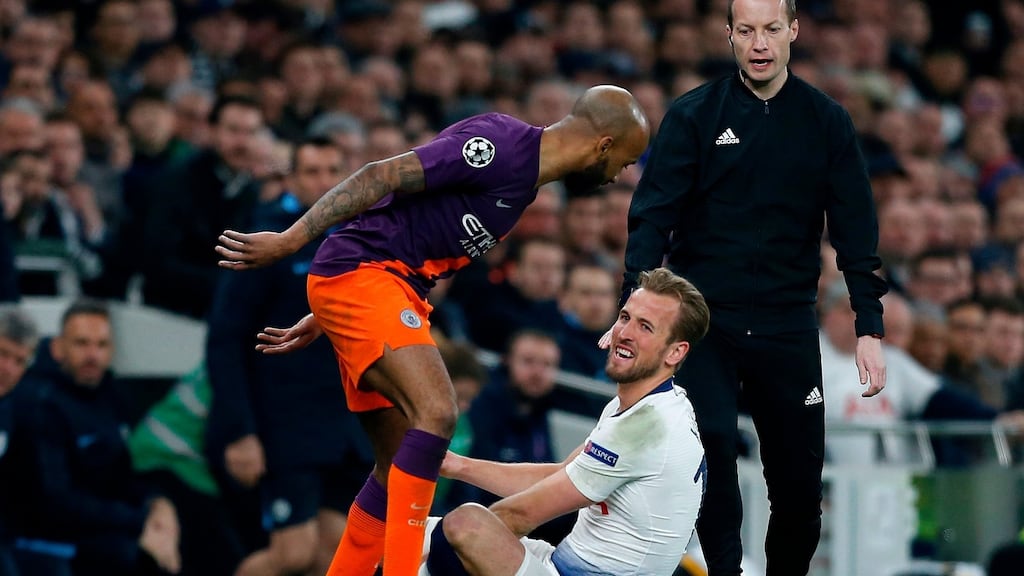 City midfielder Fabian Delph remostrates with Harry Kane before Kane leaves the pitch injured during Tuesday’s Champions match in London. Photograph: Ian KIngton/Getty Images