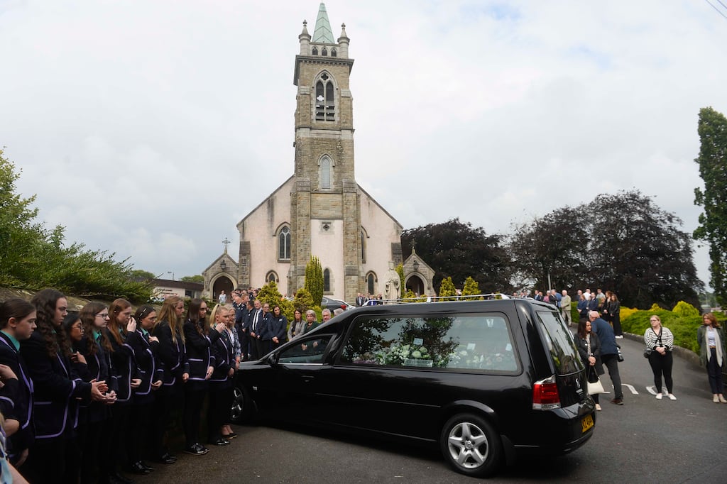 The funeral cortege for Dáire Maguire arrives at the Church of the Immaculate Conception, in Newtownbutler, Co Fermanagh on Thursday. Photograph: Mark Marlow/PA Wire