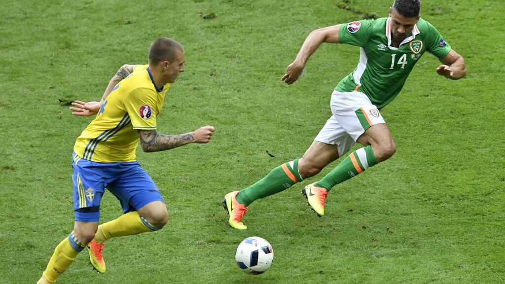 Republic of Ireland forward Jonathan Walters closes down Swedish defender Victor Nilsson-Lindelof during the Euro 2016 game at Stade de France. Photograph: Philippe Lopez/AFP/Getty Images