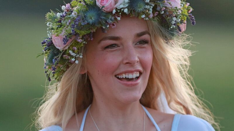 Bride Anna Lisa Van Bloem and Jeff Olsen from Utah celebrated their marriage on the Hill of Tara. Photograph Nick Bradshaw