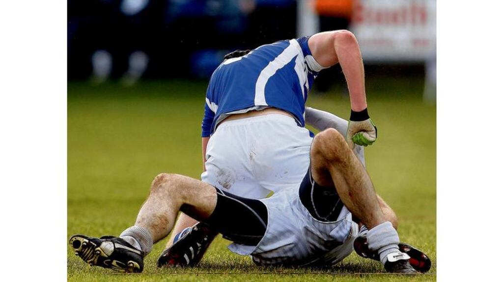 Laois' Denis Booth, who was sent off for the incident, and Kildare's Dermot Earley clash during an off-the-ball incident in yesterday's O'Byrne Cup quarter-final at O'Moore Park, Portlaoise.
