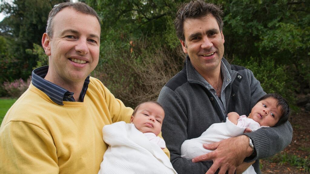 Families Through Surrogacy founder Sam Everingham and his partner, Phil Copland, with their two girls, Zoe and Ruby. Everingham founded his organisation after he experienced at first hand the lack of support for intended parents.