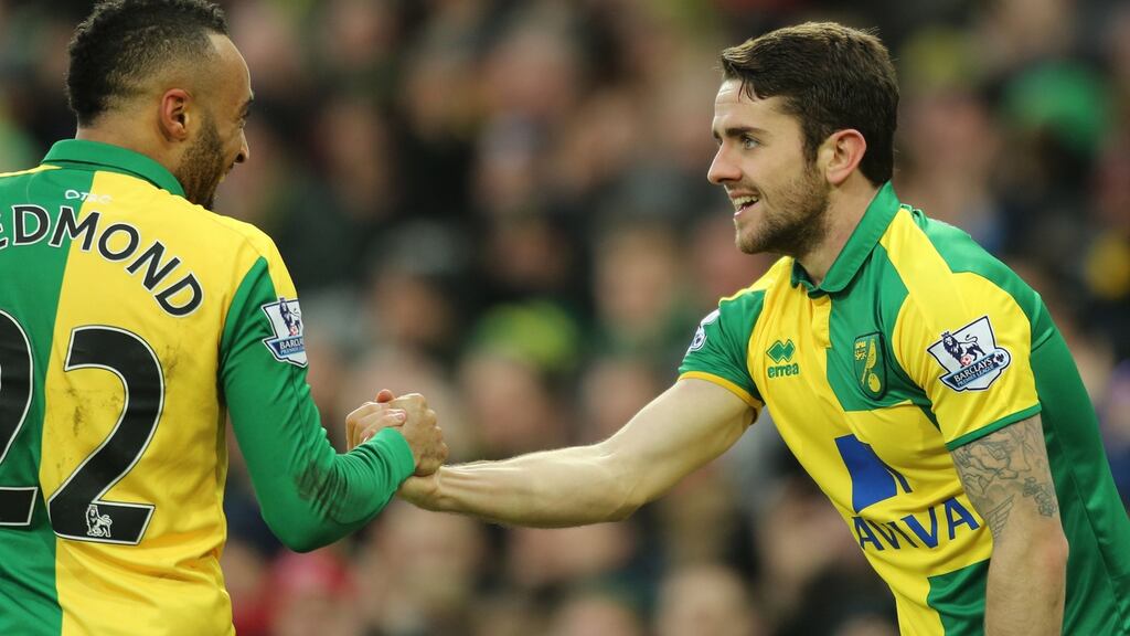 Norwich City’s Robbie Brady (right) celebrates scoring his side’s first goal of the game Photograph: Chris Radburn/PA Wire
