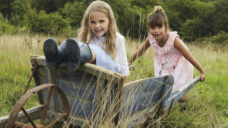 Floral and chambray dress 39 (ages 1-6) and pink ruffle dress 39 (1-6) both from The Little White Company