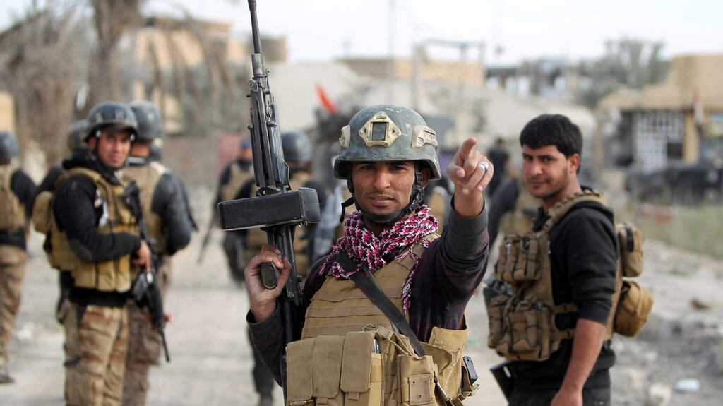 Members of Iraq’s elite counter-terrorism service secure the Hoz neighbourhood in central Ramadi, the capital of Iraq’s Anbar province on Sunday. Photograph: AFP/Getty Images