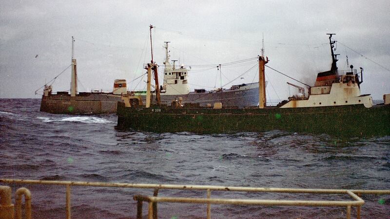 The Hull stern trawler Orsino alongside the blazing St Finbarr preparing to rescue men who drifted across on a life raft. Photograph: courtesy of the family of George William Lee