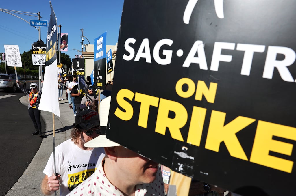 Striking SAG-AFTRA members and supporters picket outside Paramount Studios in Los Angeles.