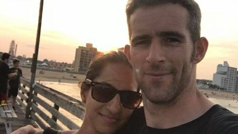 Keith Byrne with his wife and Keran. The Cork father of three  signed an application for an Irish passport on Friday, which could pave the way for his deportation.