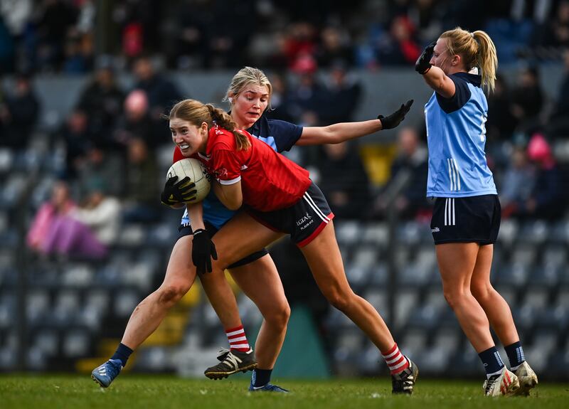 Aoife Healy of Cork is tackled by Ellen Gribben of Dublin. Photograph: Eoin Noonan/Sportsfile
