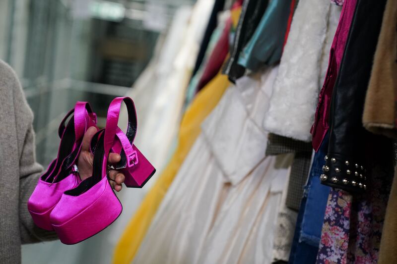 Seek out bargain pieces in second-hand shops - you could find some fashion to treasure rather than throw away. Photograph: Jacob King/PA