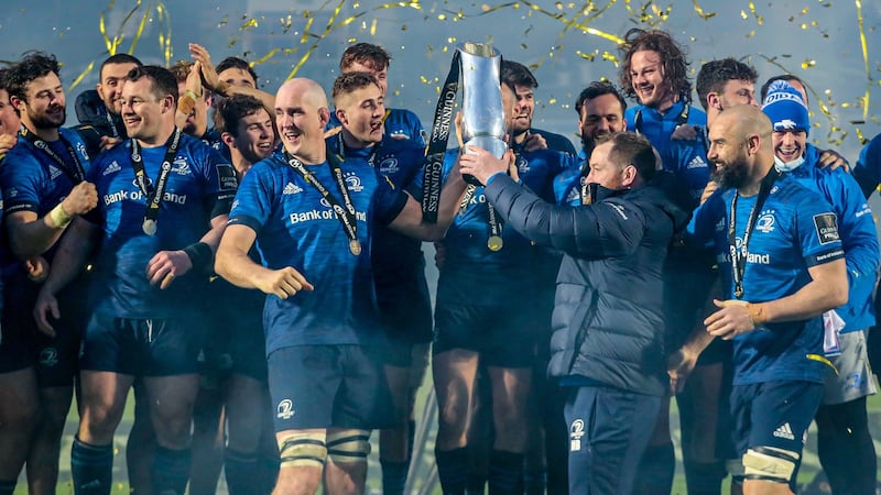 Devin Toner and Michael Bent lift the Pro14 trophy. Photograph: Dan Sheridan/Inpho