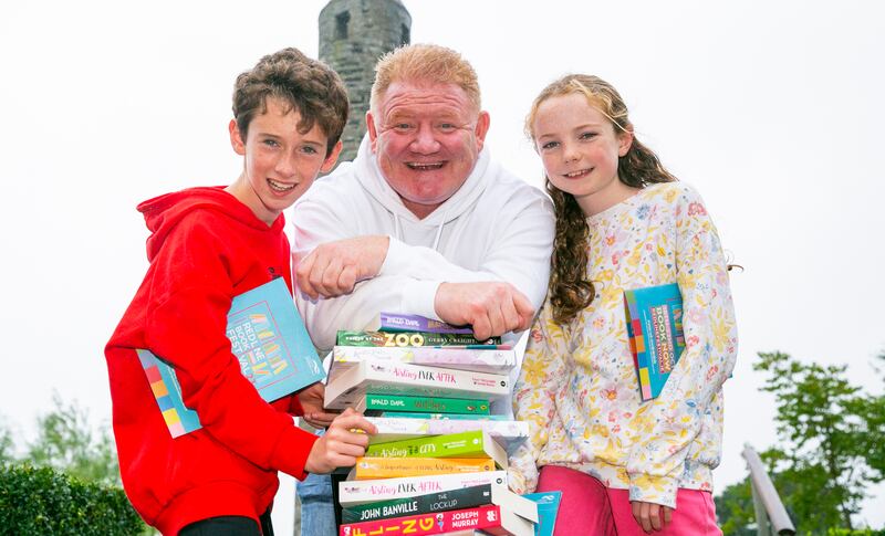 JJ Doyle (10) from South Dublin,  Gerry Creighton author of ‘My life with Elephants and other animals' and star of The Zoo TV Show and
Ciara Coleman from Knocklyon at The Red Line Book Festival  launch at Brú Chrónáin-Round Tower Visitor Centre Clondalkin, Dublin. Photograph: Gareth Chaney
