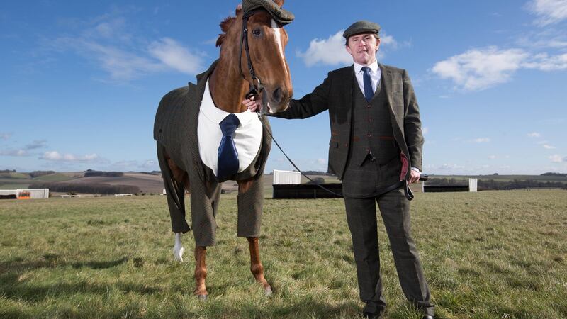 Morestead modelling a tweed suit designed by former Alexander McQueen apprentice Emma Sandham-King. Photograph: David Parry/PA Wire