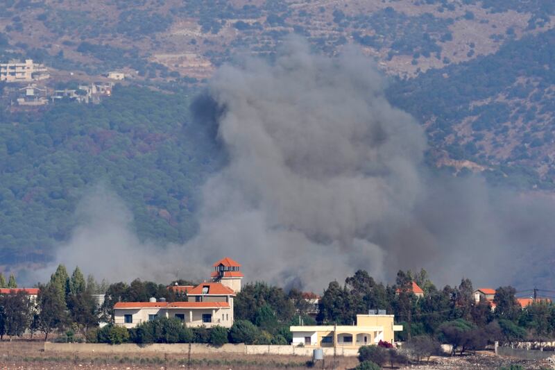 Smoke rises from an Israeli airstrike on the village of Khiam. Photograph: Hussein Malla/AP