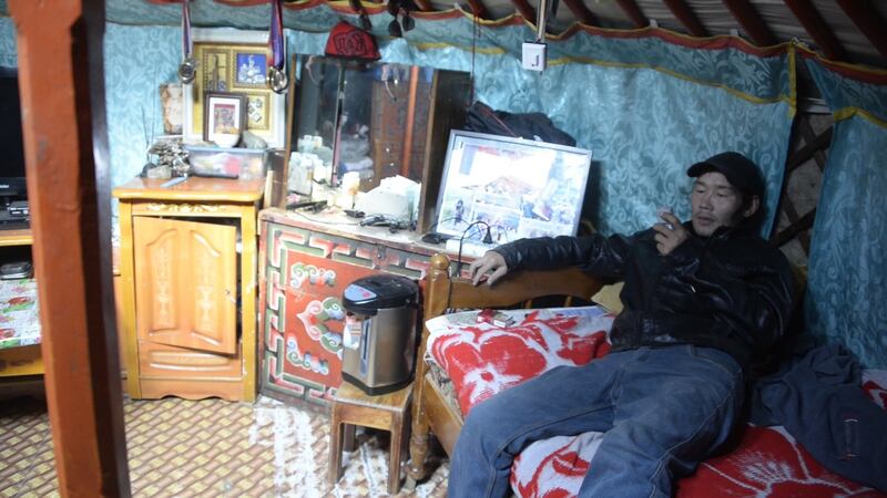 Byamba Enkhbat at home in his ger. He lost his livelihood as a nomadic farmer as his livestock ‘got skinnier by day and died one after the other’ in the harsh winter of 2007. Photograph: Didem Tali