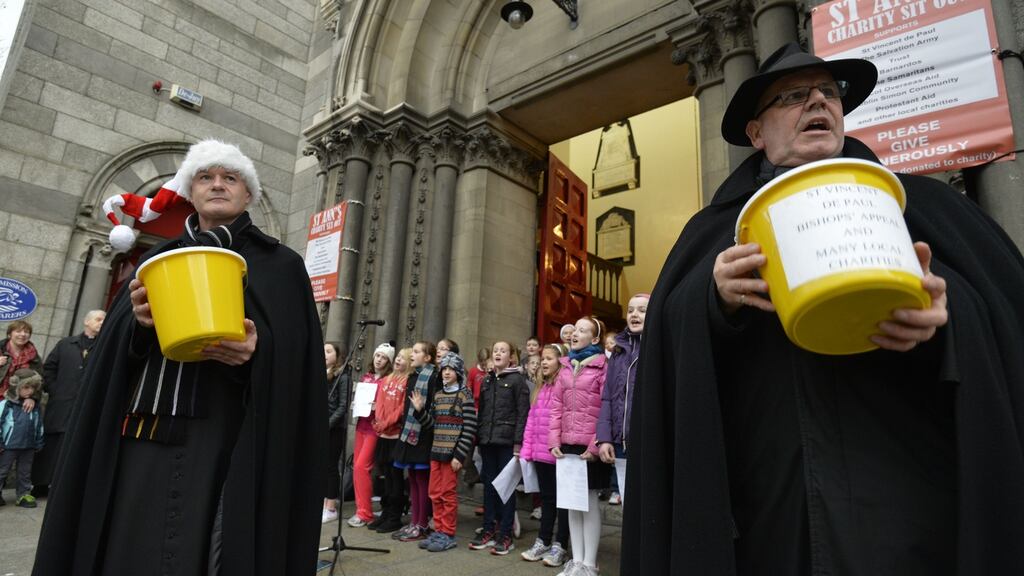 David Gillespie and Fred Deane in 2013 fundraising during the annual Black Santa Appeal in Dublin. Photograph: Alan Betson