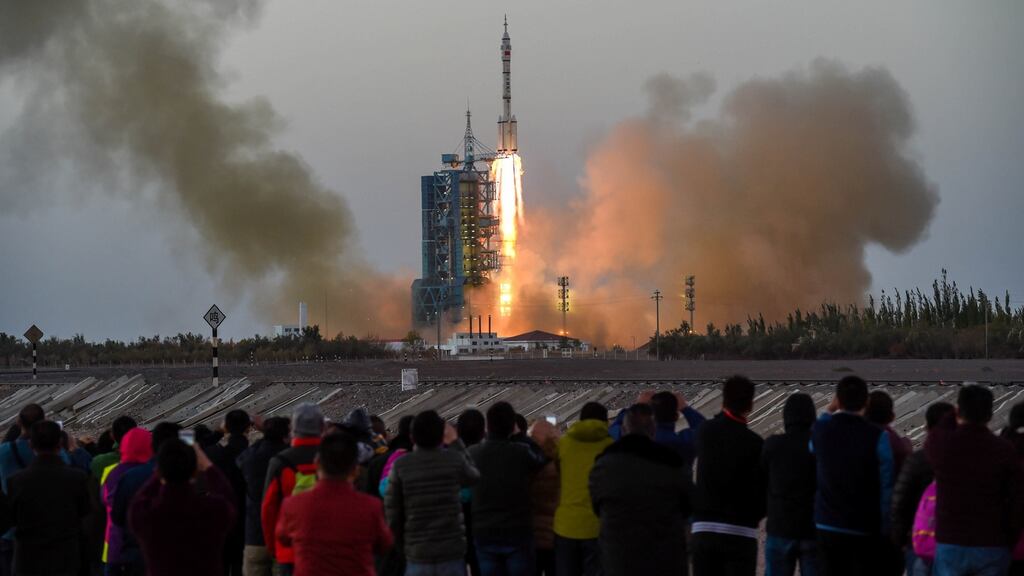 Shenzhou 11 manned spacecraft carrying astronauts Jing Haipeng and Chen Dong blasts off from the launchpad in Jiuquan, China. Photograph: Reuters