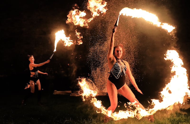 Fire performers from Broken Theatre light up the walls of Trim Castle