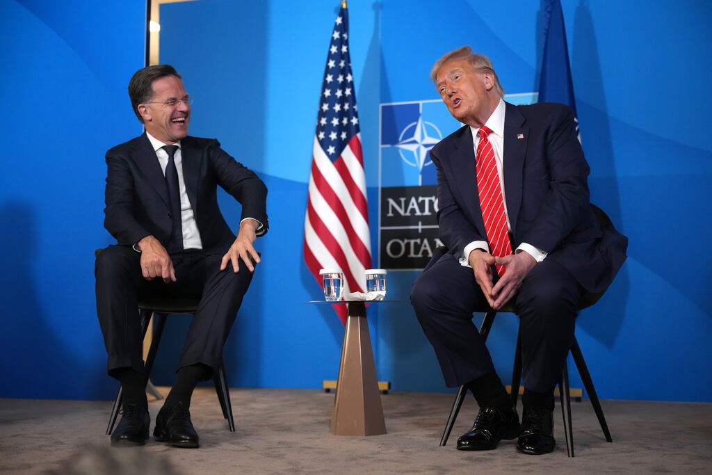 Nato secretary general Mark Rutte and US president Donald Trump speak to the media at the start of the second day of the Nato summit in The Hague. Photograph: Andrew Harnik/Getty