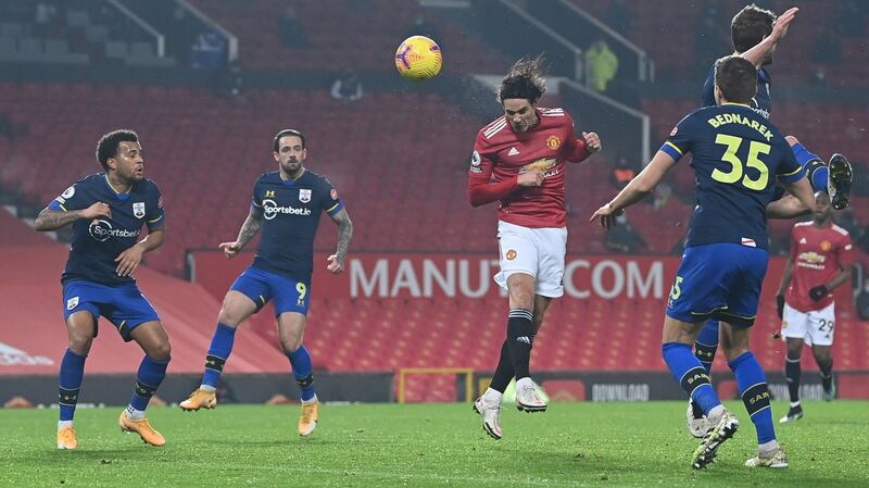Edinson Cavani leaps to score Manchester United’s fourth against Southampton. Photograph: Laurence Griffiths/PA