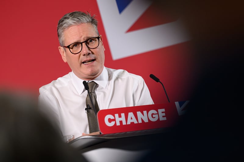 Labour Party leader Keir Starmer addresses party members and media in Lancing Parish Hall, with the Union Jack flag in the background. Photograph: Leon Neal/Getty Images