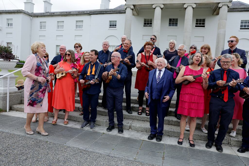 President Michael D Higgins and Sabina Higgins with the Dublin Ukulele Collective at Áras an Uachtaráin for the HeForShe garden party.
Photograph: Maxwells