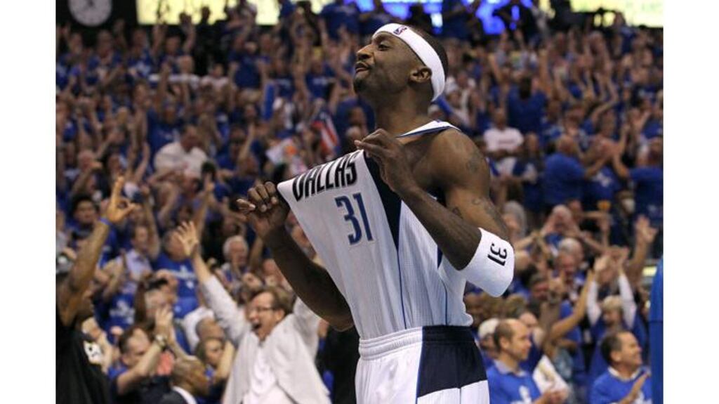 Jason Terry of the Dallas Mavericks celebrates one of his three-point shots late in the fourth quarter last night. Photograph: Ronald Martinez/Getty Images