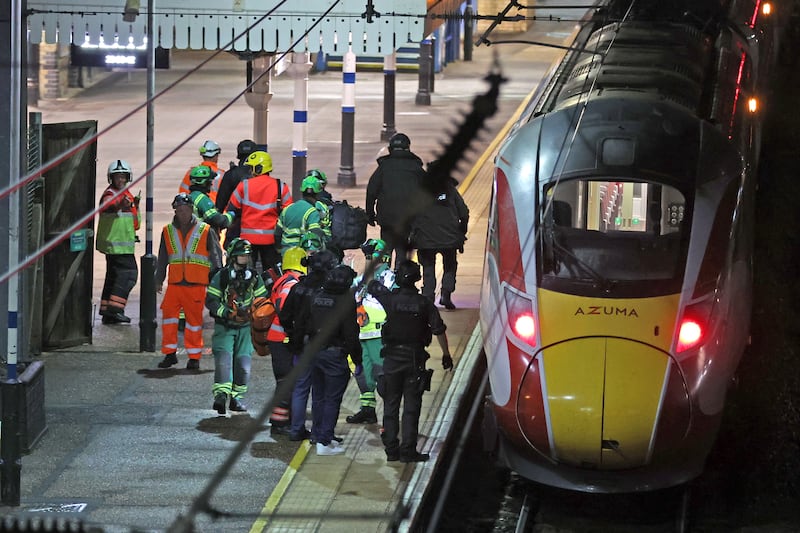 One man remains in custody after mass stabbing on train in England, police say