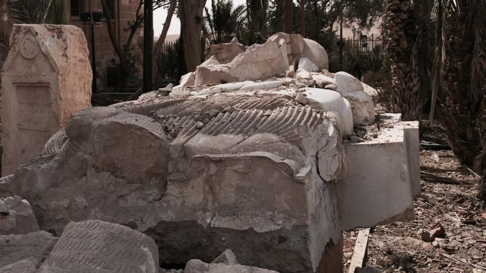 The Lion of Lat, a first century BC statue of a lion gripping a crouching gazelle, now a flattened jumble of stones. Photograph: Michael Jansen