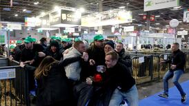 French farmers storm Paris agriculture fair ahead of visit by Emmanuel Macron