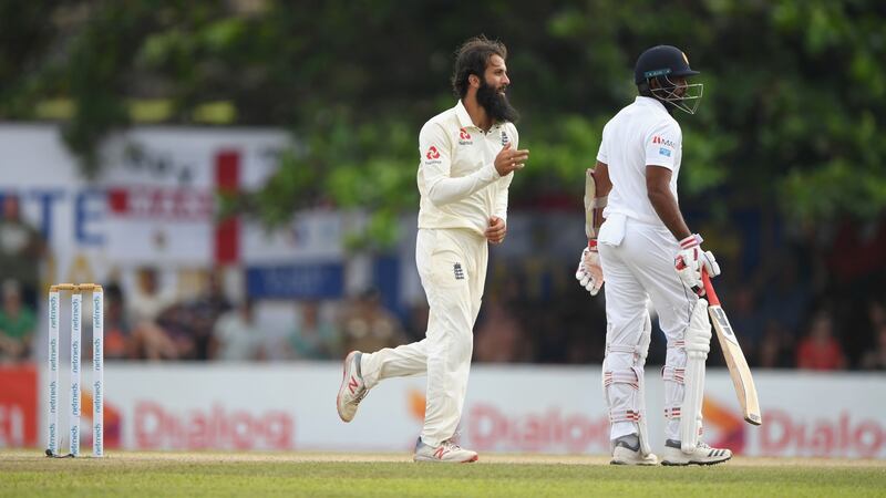Moeen Ali celebrates after taking the wicket of Angelo Matthews. Photograph: Stu Forster/Getty
