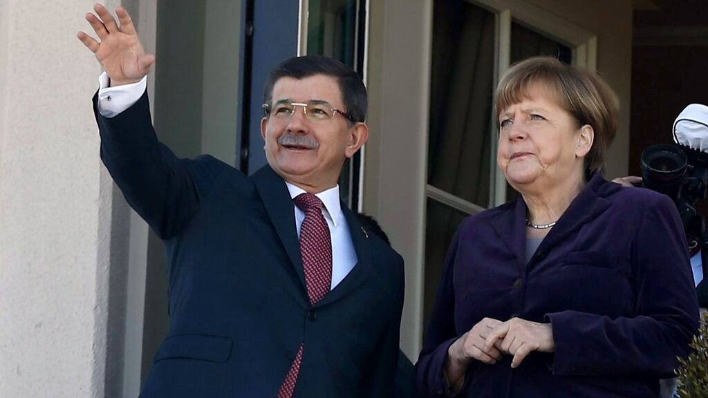 Turkish prime minister Ahmet Davutoglu and German chancellor Angela Merkel at a meeting in Ankara. Photogrraph: Adem Altanadem Altan/AFP/Getty Images