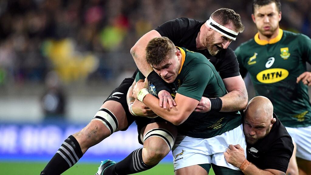 South Africa’s Malcolm Marx is tackled by New Zealand’s captain Kieran Read who returns to the side having missed the game against Argentina. Photograph: Ross Setford/Reuters