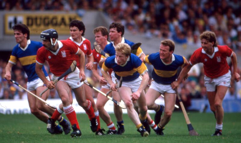 Cork and Tipperary players during the Munster hurling final at Semple Stadium in July 1987. Photograph: Billy Stickland/Inpho