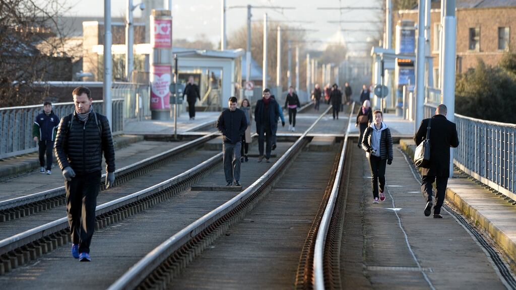 Commuters walking on Luas strikes during previous strike. File photograph: Eric Luke / The Irish Times