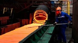 China targets GDP growth of 6.5% while moving to cut debt