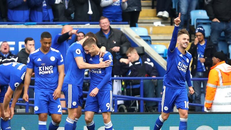 Leicester celebrate after Jamie Vardy scored his side’s second goal against Arsenal. Photograph: Julian Finney/Getty