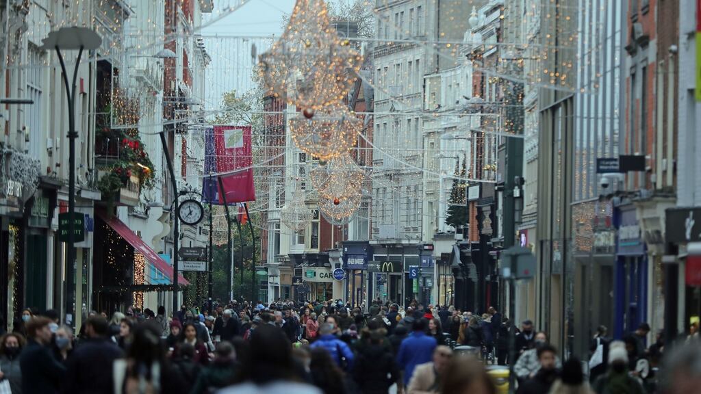 People shop on Grafton St in Dublin city centre, as shops reopen after six weeks of closure. Photograph: Niall Carson/PA Wire