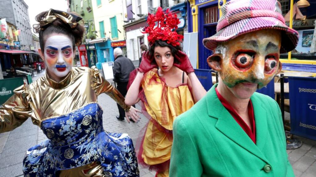 Macnas performers Helen Gregg, Yvette Picque and Debbie Wright window gazing in Galway's Quay Street during the announcement of the Macnas Halloween parade 'Symphony for the Restless'. Photograph: Joe O'Shaughnessy